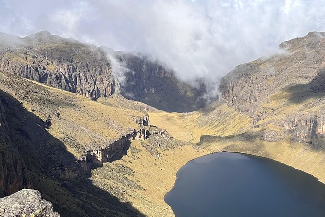 4 Day Mount Kenya Trek Up Chogoria Down Sirimon - Day 1: Chogoria Banda to Lake Ellis (Forest, Falls, and the Giant Billiard Table)