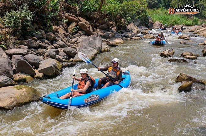 8KM White Water Rafting and 3HRS Jungle Trekking Adventure - The 8km river ride on the Mae Taeng: inflatable comfort with guide support