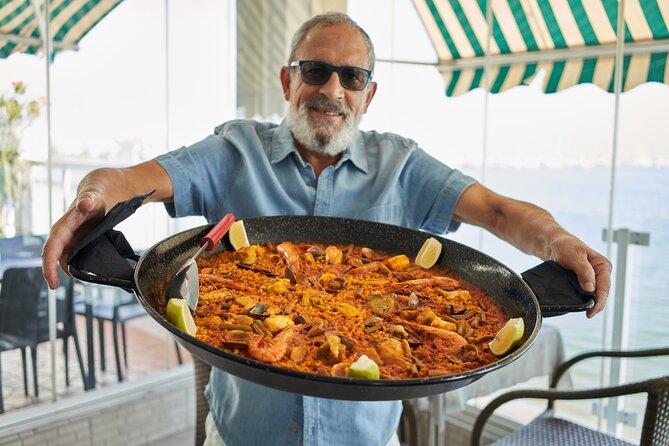 Albufera Private Day Tour: Paella, Boat Cruise and Nature Walk - Bon Aire lunch: paella that ties directly into the lake-town setting