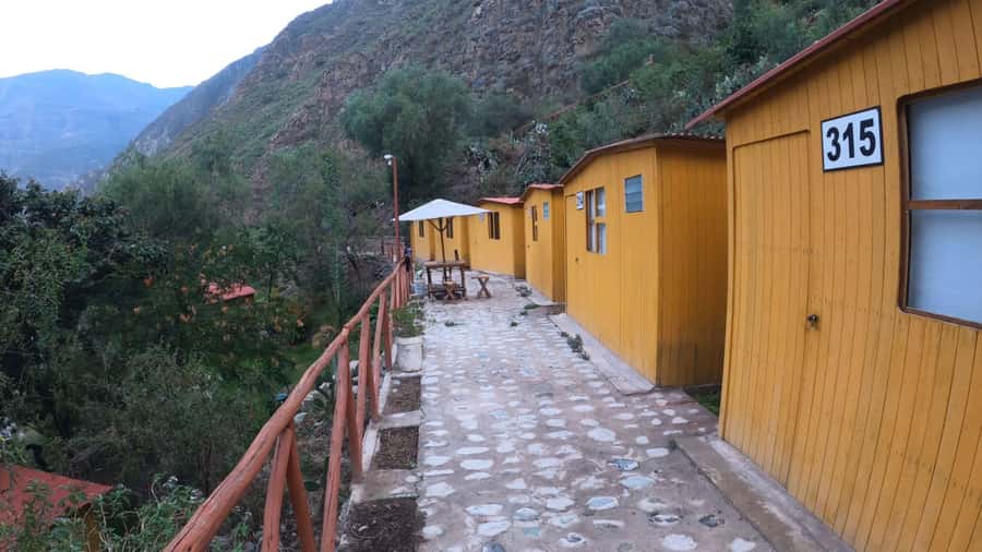 Arequipa: 2-day Colca Canyon Trekking, Ending in Puno - The Colca descent: long steps, suspension bridges, and a river rest