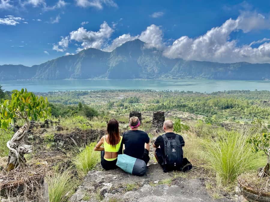Bali: Mount Batur Guided Sunrise Trek with Breakfast - The return trail: lava texture, purple bloom grass, and macaque moments