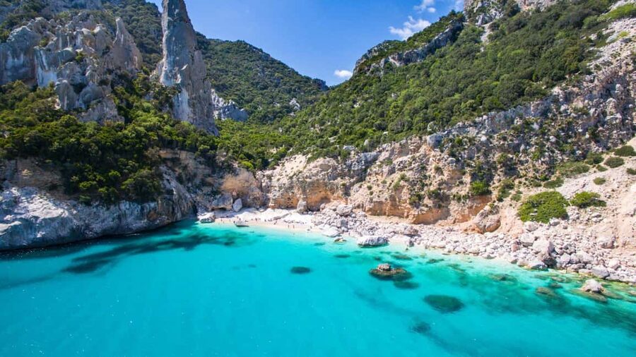 Baunei: Cala Goloritzè Trekking Tour with A Guide - Cala Goloritzè entry limits and the €7 ticket reality