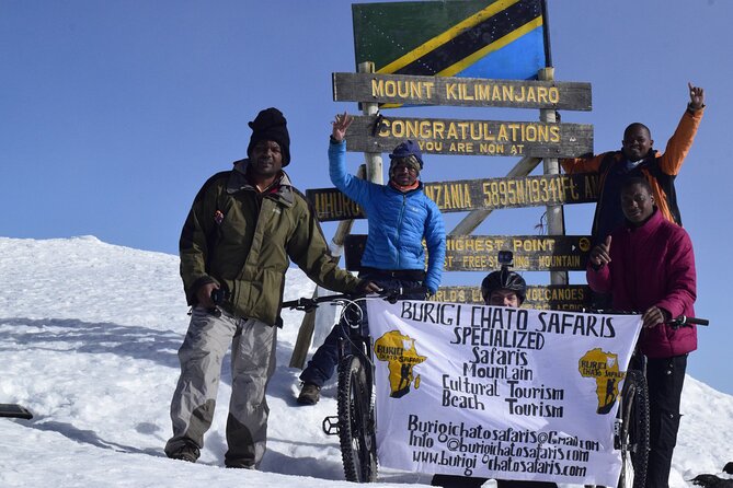 Best 5 Days Kilimanjaro Bike Trek Tour via Marangu Kilema Route - Day 4: Hans Meyer’s Cave, Gilman’s Point, then bike to Uhuru Peak