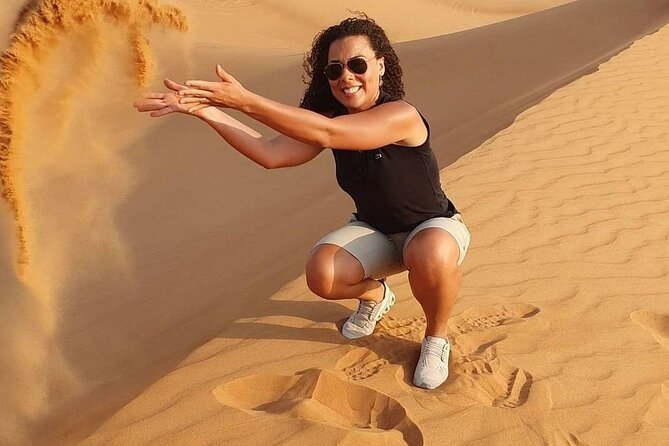 Camel Trekking in Dubai Desert with BBQ and Live Shows - Camel Ride and Sandboarding: Low-Pressure Desert Skills