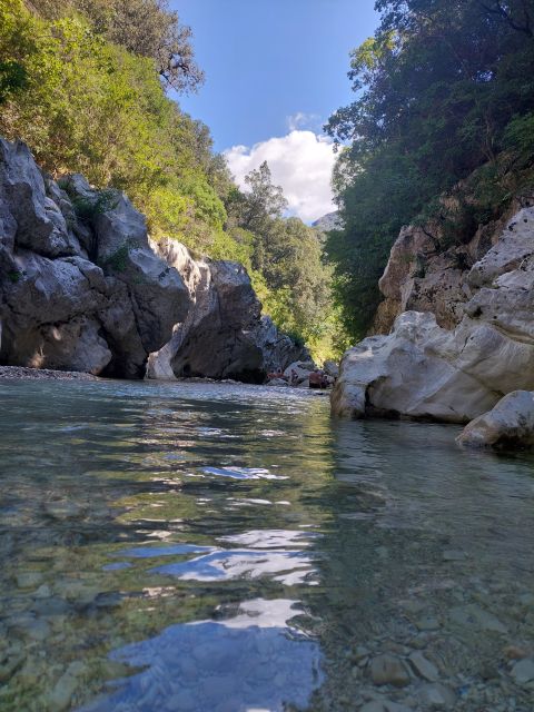 Corfu: River Trekking in the Greek mainland with Ferry Trip - Waterfall finale at the river source: clear water, hidden spots, and a place to remember