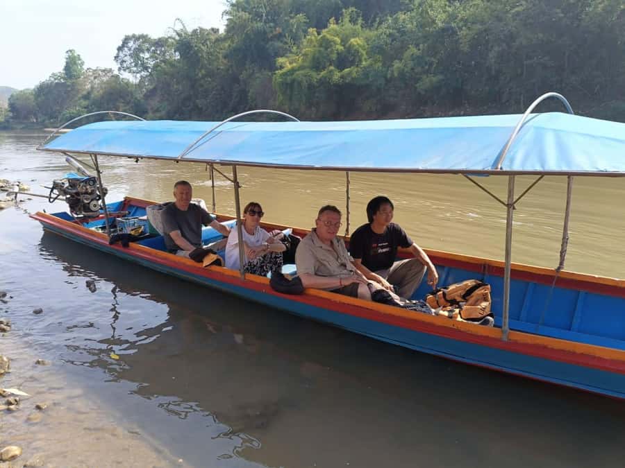 Cultural trekking and boat trip - Long-tail boat on the Mae Kok River and the Buddha cave views