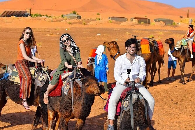 Desert excursion with camel trek into the camp Dinner breakfast - Stop 1: The 1-Hour Camel Ride and the Sandboarding Burst
