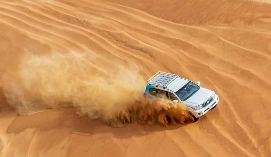 Dubai Sunrise Desert Camel Trek with Breakfast - Breakfast box + low-seating Arabian style: simple and satisfying