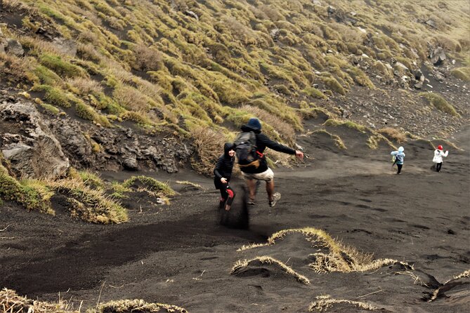 Etna's Hidden Gems - Trek Valle Bove & Lava Tunnel with Gear - Lava Tuba: Helmet, Flashlight, and the Sound of Volcanic Darkness