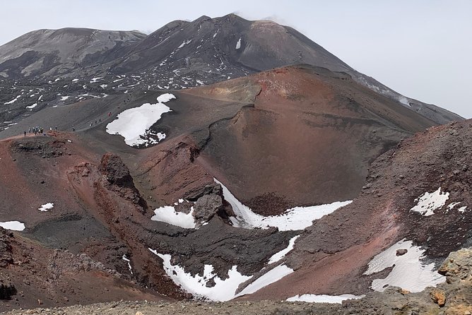 Etna South Trekking in summit area - Stop at Mount Etna: craters, Valle del Bove, and a lava-flow cave view