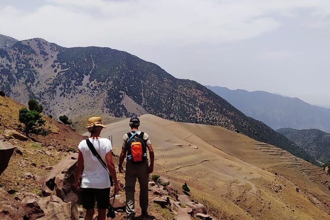 From Marrakech: Atlas Mountains Talamrout Summit day hike & Trek - Summit time: Toubkal views, valley panoramas, and lunch on the way down