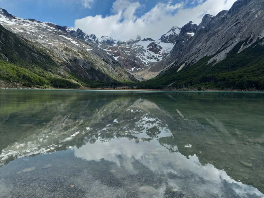 From Ushuaia: Tierra del Fuego Emerald Lagoon Trekking Tour - Weather reality: rain or shine and the muddy Patagonia factor