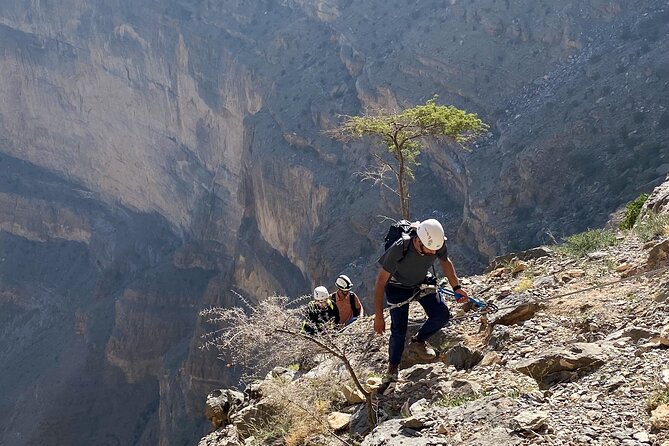Full-Day Via Ferrata & Balcony Trekking - Wadi Ghul and the old village glance before you clip in