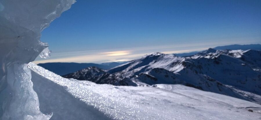 Granada: Sierra Nevada Veleta Peak Trek with Lunch - Snowshoes in winter, sticks in summer: what your legs should expect