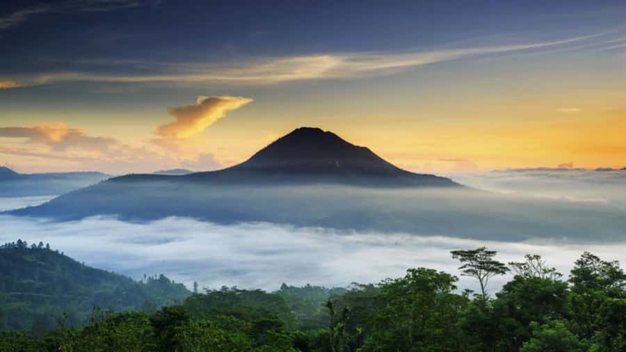 Mount Batur: Sunrise Dirt Bike Trek with Trained Riders - The summit moment: sunrise colors, lake calm, and volcanic scale