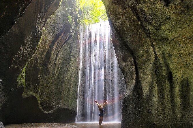 Mount Batur Sunrise Trekking and Hidden Waterfall - Tukad Cepung Waterfall: getting the sun beam effect
