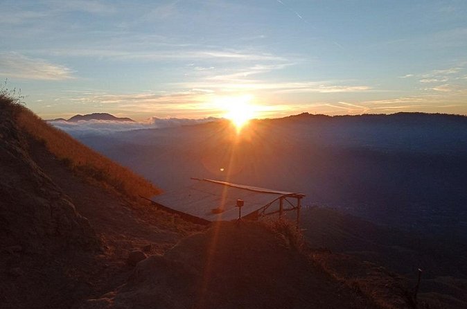 Mount Batur Sunset Trekking Tour - Sunset Timing and Summit Views: Lake Batur and Mount Agung