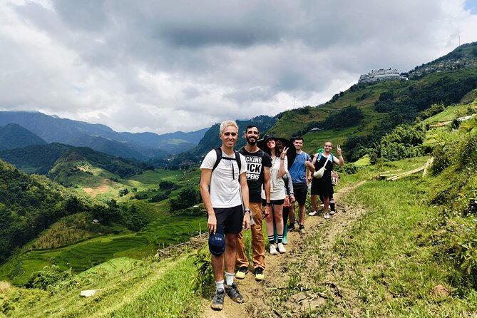 One Day Sapa Trekking to Lao Chai and Ta Van Villages - Stop-by-Stop: Lao Chai Hmong Homes, Brocade Shopping, and Lunch