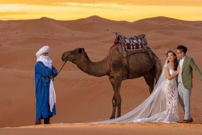 Overnight stay in desert camp & Camel trekking in the Sahara - Day 1 in the dunes: Berber tea, camel ride, sunset, and Berber drums