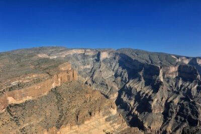 Private Full Day Trekking In the Grand Canyon (Balcony Walk) - Wadi Ghul Village Stop: Seeing a 2000-Year-Old Abandoned Place