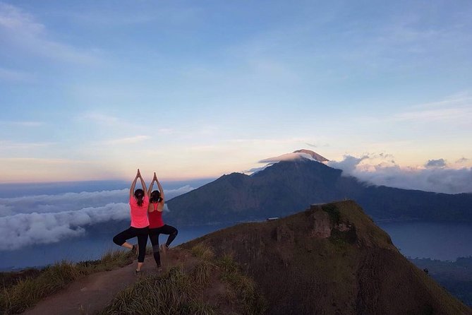 Private Mount Batur Sunset Trekking - All inclusive tour - Climbing Mount Batur: Walking Sticks and What Slippery Volcanic Stone Feels Like