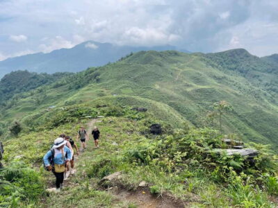 Sapa: 1-Day Trek to Mountain, Local Villages & Rice Terraces - Dragon Jaw Mountain views: Sapa town, Muong Hoa valley, and Fansipang