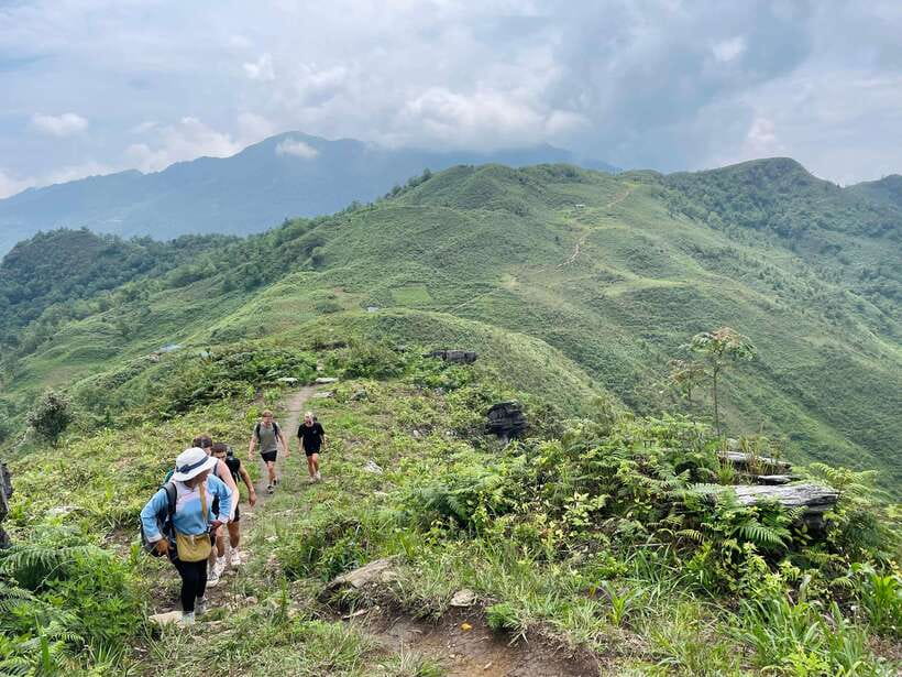 Sapa: 1-Day Trek to Mountain, Local Villages & Rice Terraces - Dragon Jaw Mountain views: Sapa town, Muong Hoa valley, and Fansipang
