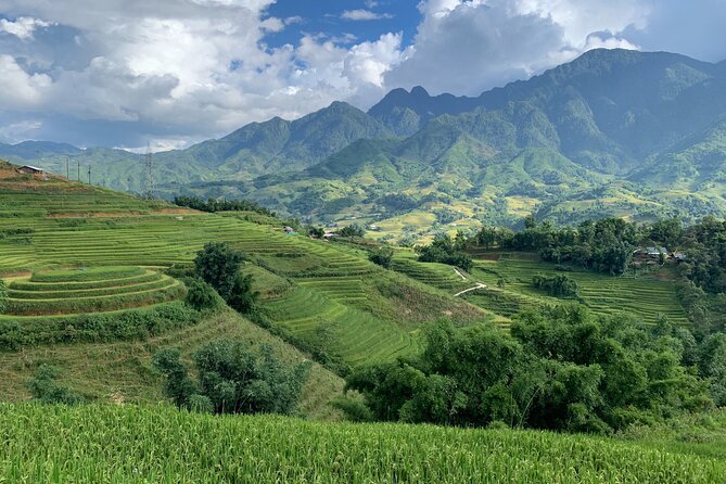 Sapa Trekking Tour 2 Days 1 Night By Bus - Waterfall time and traditional food: don’t ignore the simple stops