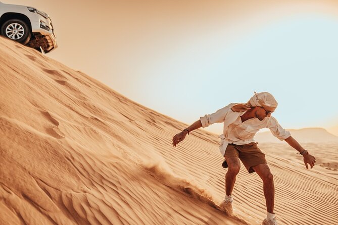 Sunrise/Morning Dune Drive with Camel Trek & Sand Surfing - Key Highlights You’ll Feel Right Away