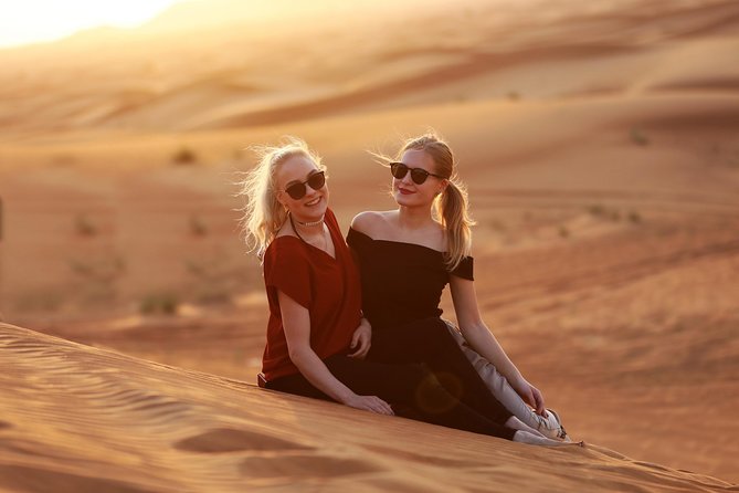 Sunset Camel Trek & Red Dunes Safari with BBQ at Al Khayma Camp From Dubai - Henna, Shisha, and the Falcon Photo Moment
