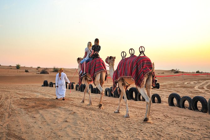 Sunset Camel Trek & Red Dunes Safari with BBQ at Al Khayma Camp From Dubai - Majilis-Style Desert Camp Time: Less Rush, More Doing