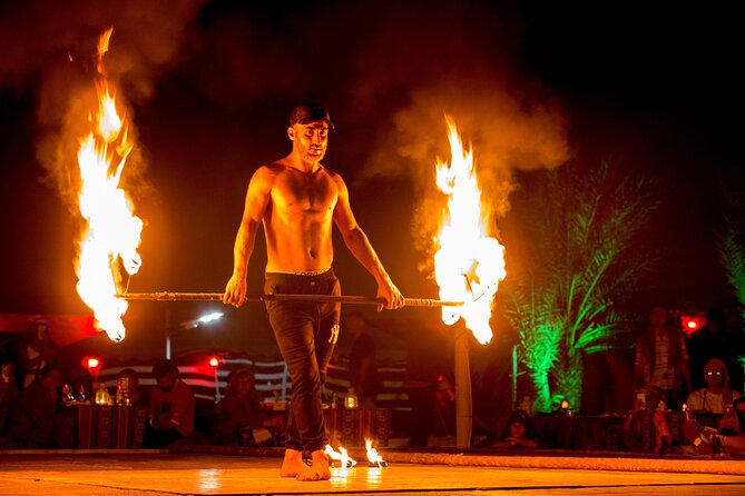 Sunset Camel Trekking with Falcon Show & VIP BBQ Dinner - Bedouin camp: falcons, henna, and the entertainment set