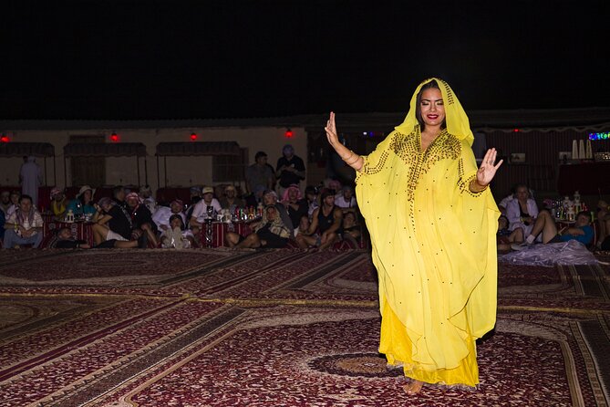 Sunset Camel Trekking with Falcon Show & VIP BBQ Dinner - The show schedule: Tanura and belly dance in context