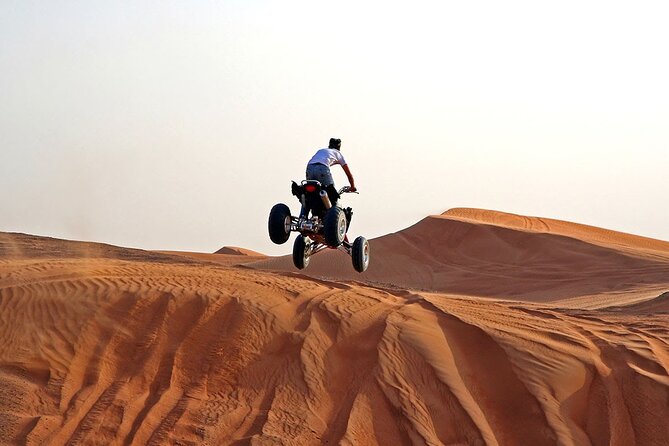 Sunset Quad Bike Safari With Camel Trek, Live Shows and Dinner - Camel Trek and Desert Activities: Switching Gears After the Ride
