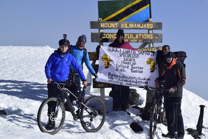 Top 6 Days Mt. Kilimanjaro Bike trek Tour by Marangu-Kilema Route - Day 5: 4:00 am zigzags, Hans Meyer’s Cave, and the Uhuru Peak bike ride