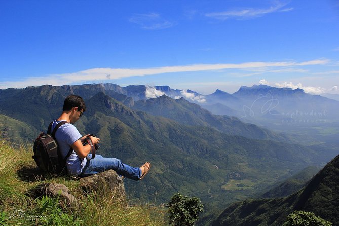 Trekking in Munnar - Ridge walk to the top: grasslands, rock, and big-sky views