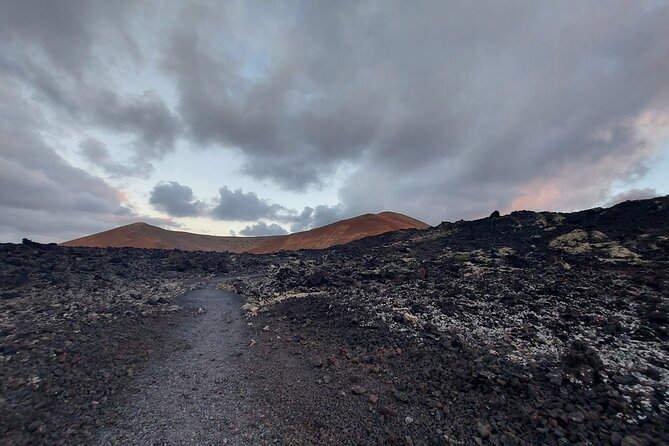 Trekking in the Volcanoes Natural Park in a small group - Timanfaya Volcano Trek: What You’ll Be Walking Through