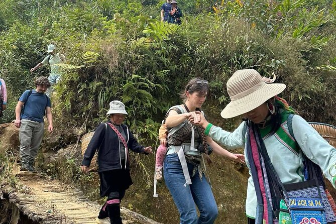 Trekking SaPa 2-Day Local Adventure with Homestay & Guide - Day 1: Muong Hoa Valley trail views with Y Linh Ho, Lao Chải, and Ta Van
