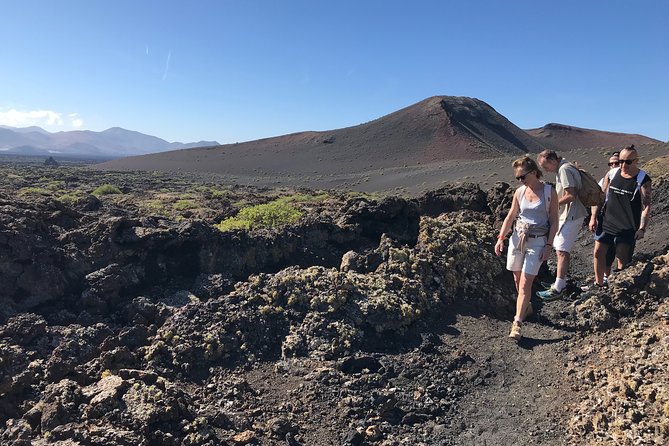 Volcano Trekking Tour (Timanfaya eruptions) - Entering la Rilla Volcano: craters, rims, and close lava views